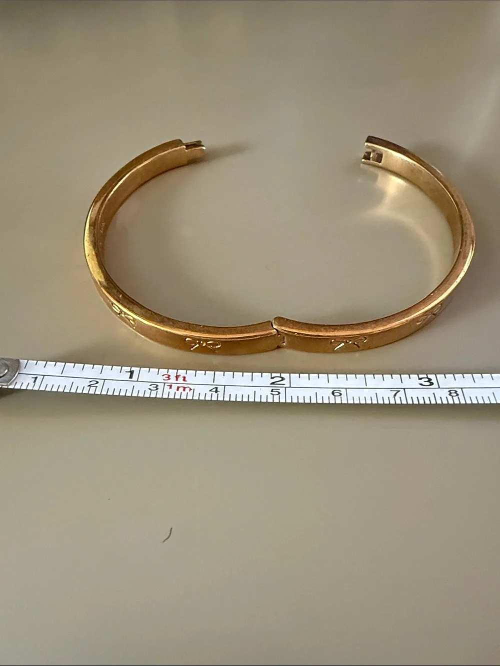 kate spade Gold Bow-Embossed Bangle Bracelet